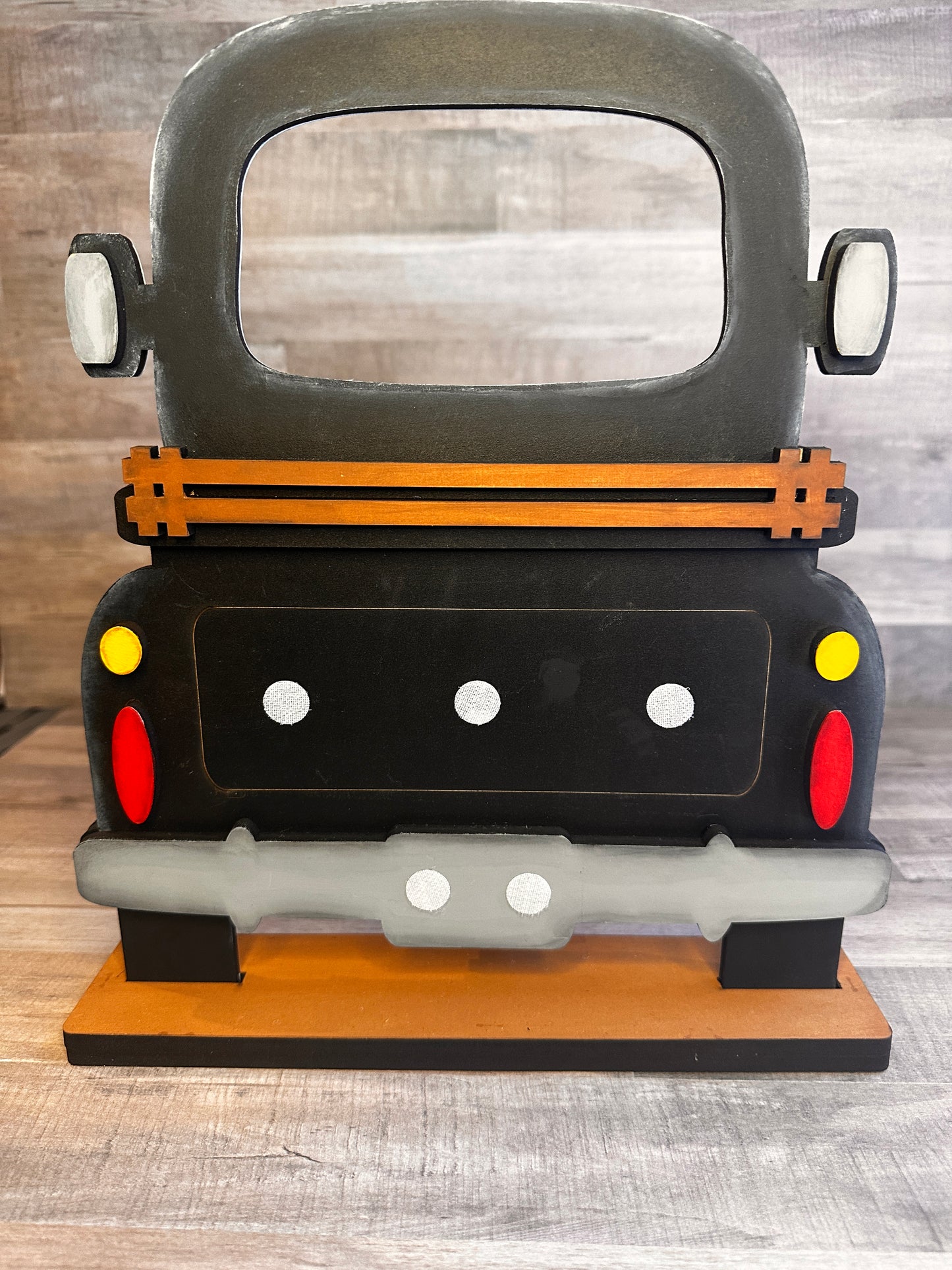 Hand-painted Farmhouse Truck used with our interchangeable inserts that can be purchased separately. Shown with out inserts. Inserts can be added easily with the hook and loop dots shown in picture.