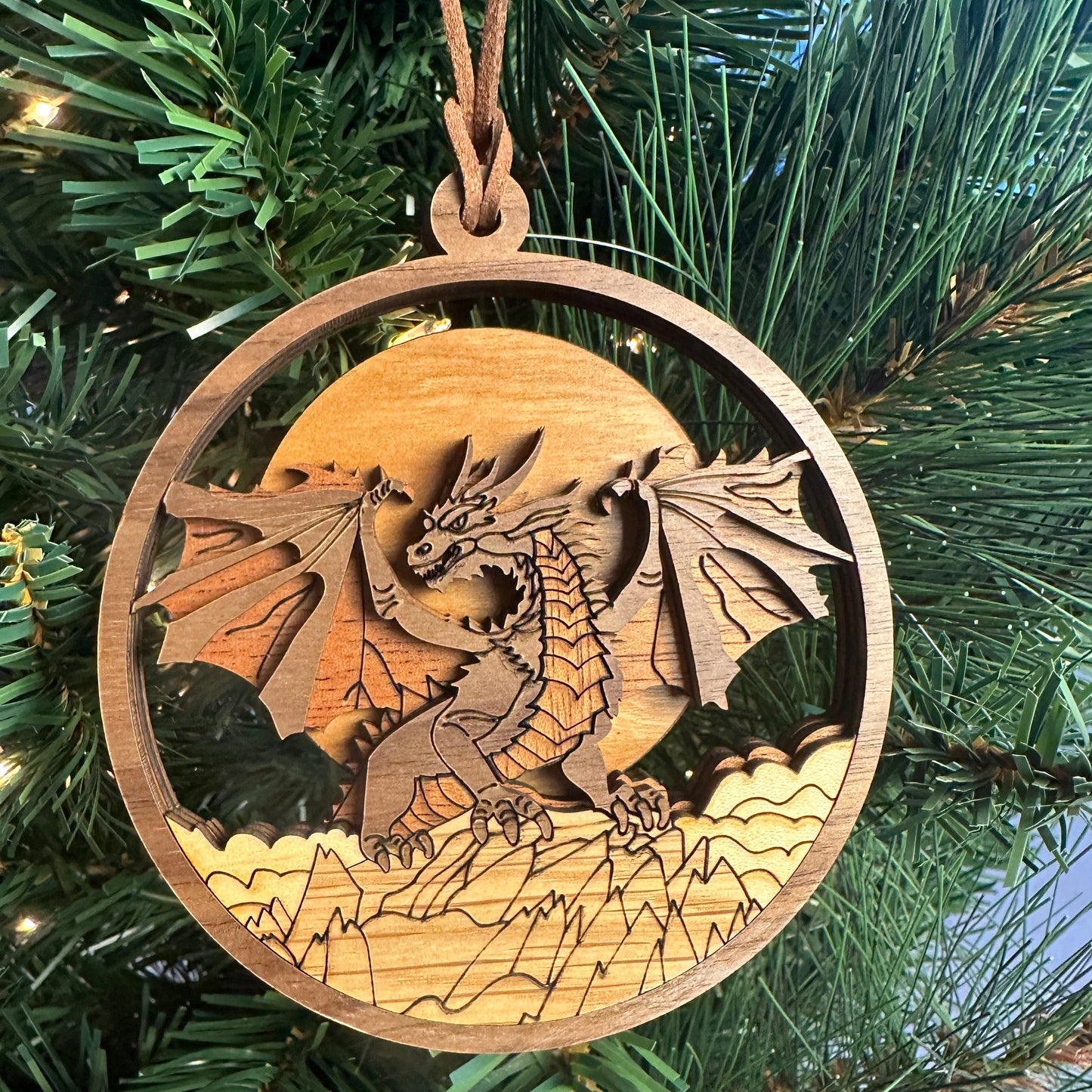 Wooden dragon ornament on a Christmas tree