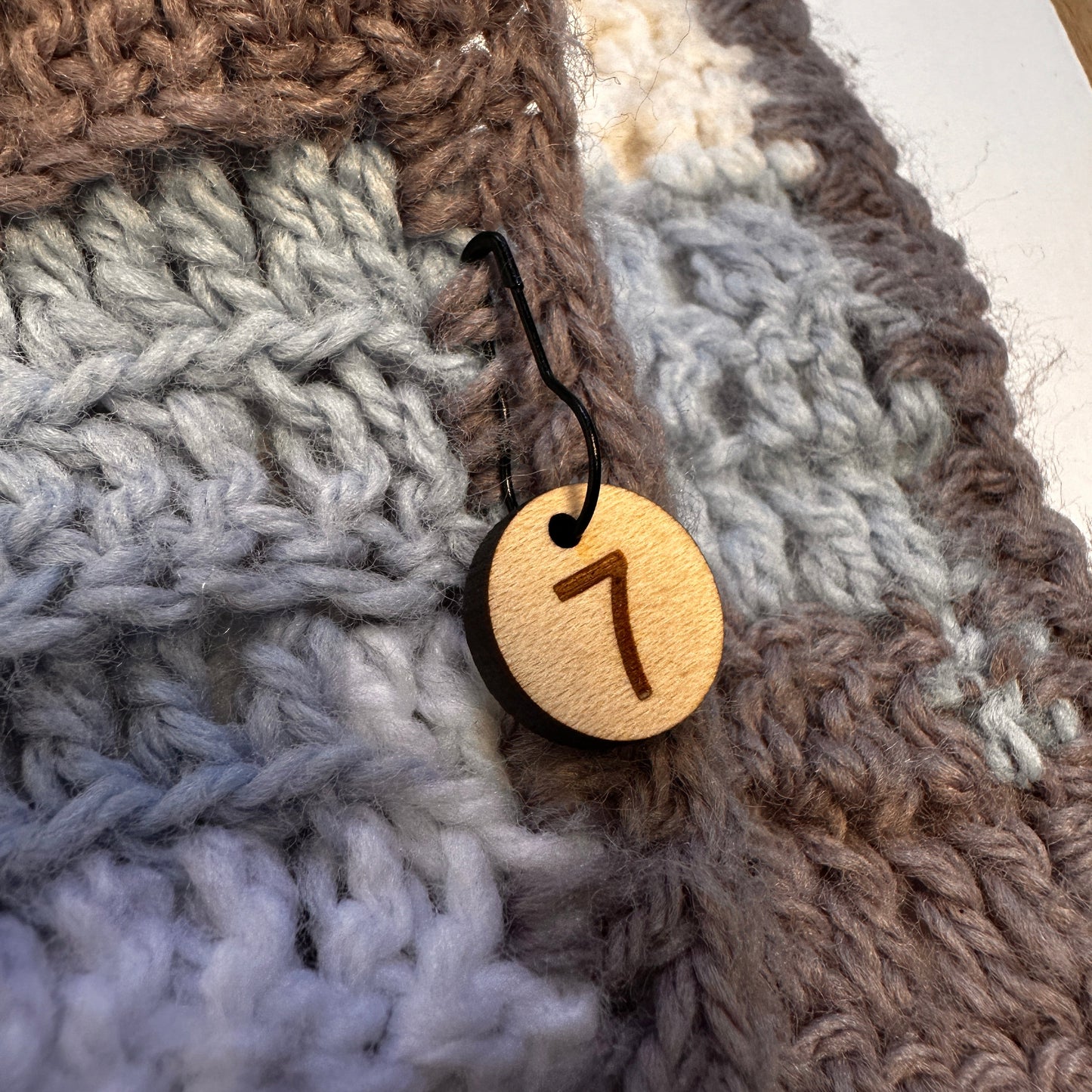 Wooden stitch marker number  for row number seven. Included in set 1-10