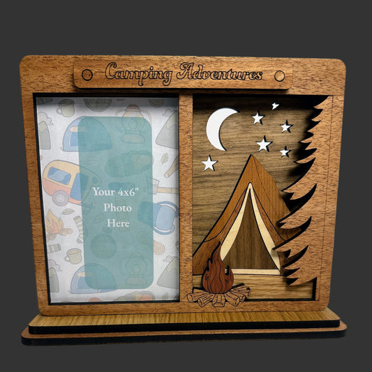 Wooden photo frame with camping design on a gray background